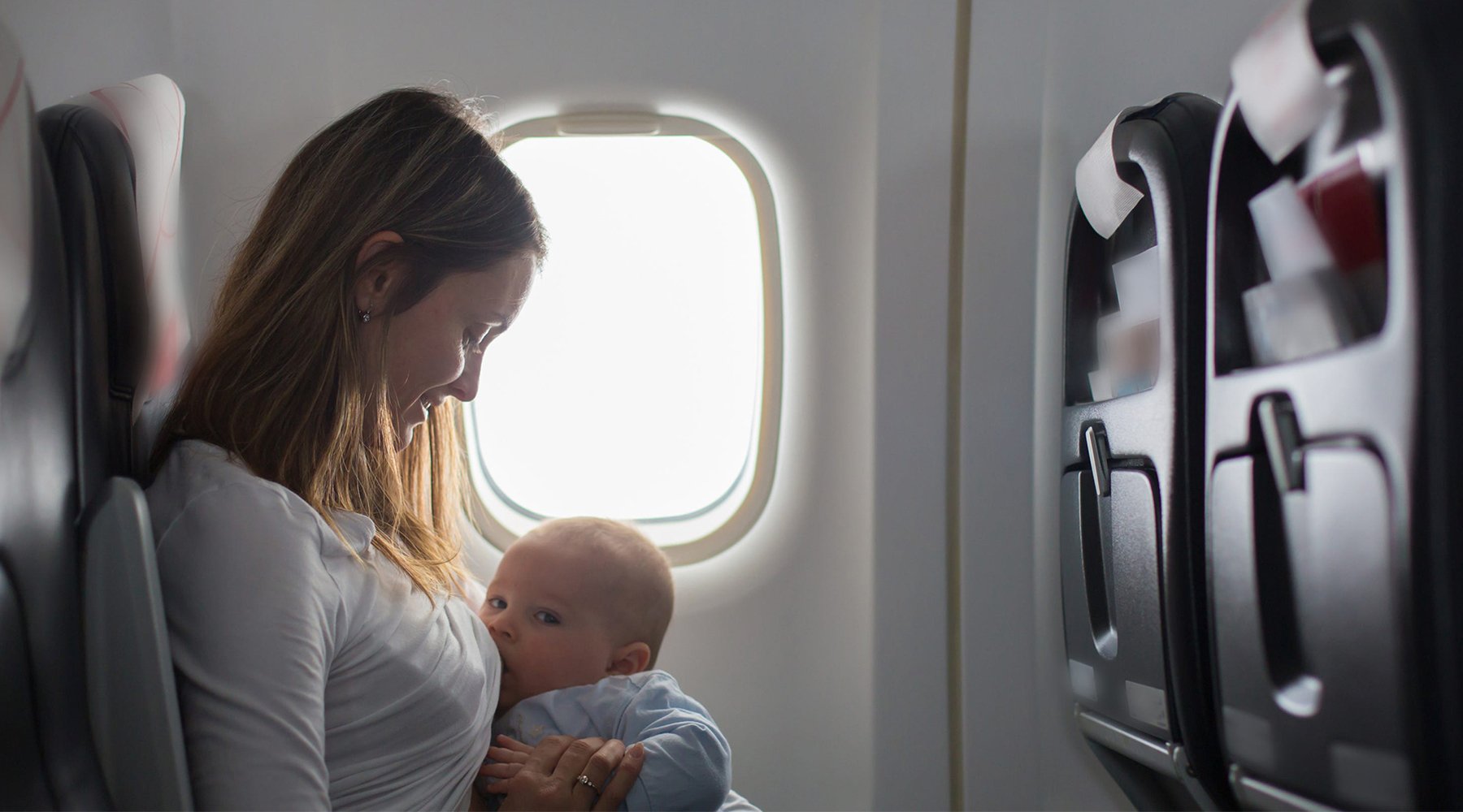 Tips for Breastfeeding on a Plane - Lovemère